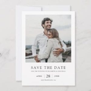 simple modern black and white wedding save the date card with photo and borders and a vintage polaroid look