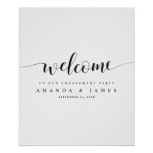 simple modern black and white wedding engagement party welcome sign with whimsical script