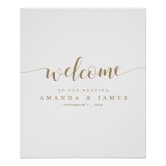 simple modern minimalist wedding welcome sign with text in gold and a whimsical script on a white base