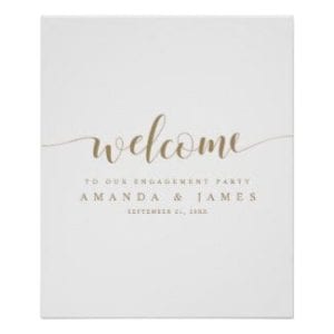 simple modern gold and white wedding engagement party welcome sign with whimsical script