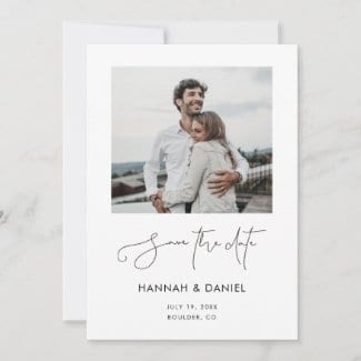 modern minimalist wedding save the date card with black script, white borders and photo