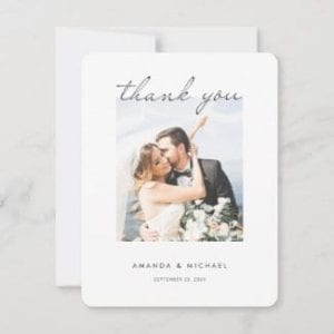 simple modern wedding thank you card with photo and white borders and black script