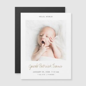 Magnet birth announcement with photo and gold script in gender neutral design.