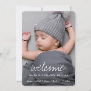 Baby photo announcement cards with welcome in modern white script.