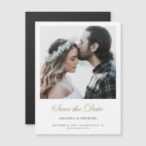Elegant save the date magnet with photo and gold script.