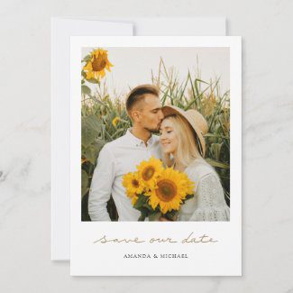 Simple photo save the date cards with gold handwriting.