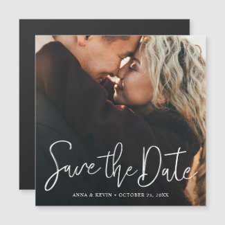Square wedding save the date magnets with photo and modern white typography.