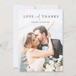 Photo wedding thank you card with modern black typography.
