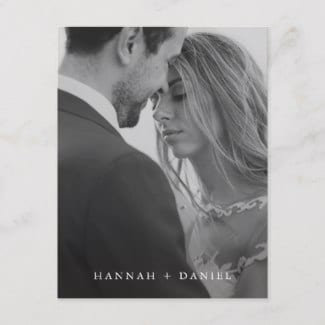 simple, minimalist wedding save the date postcard with black and white photo and first names at the bottom