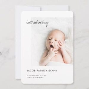 minimalist birth announcement card black and white with introducing in modern script with photo