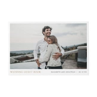 Simple modern wedding guest book with photo and names in gold
