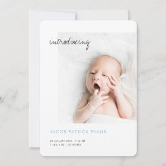 simple modern custom boy birth announcement with photo and name in baby blue